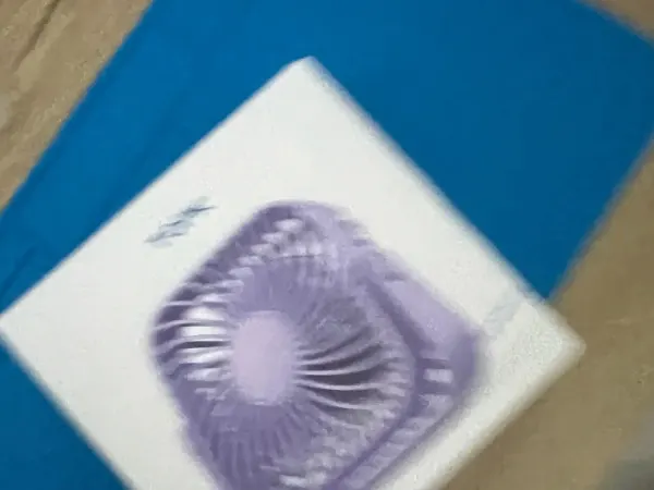 Aermio Mini violet dans son emballage ouvert, photo envoyée par un acheteur vérifié